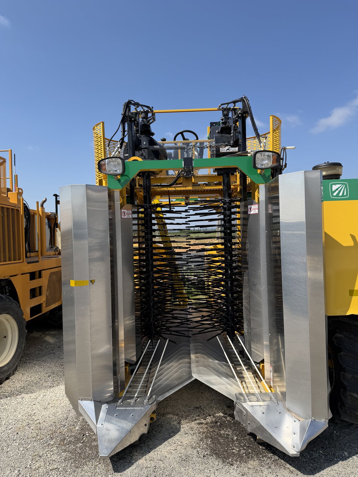 Front view of berry harvester head with picking rods