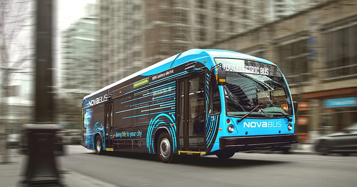 Nova Bus LFSe+ battery-electric transit bus in an urban downtown setting